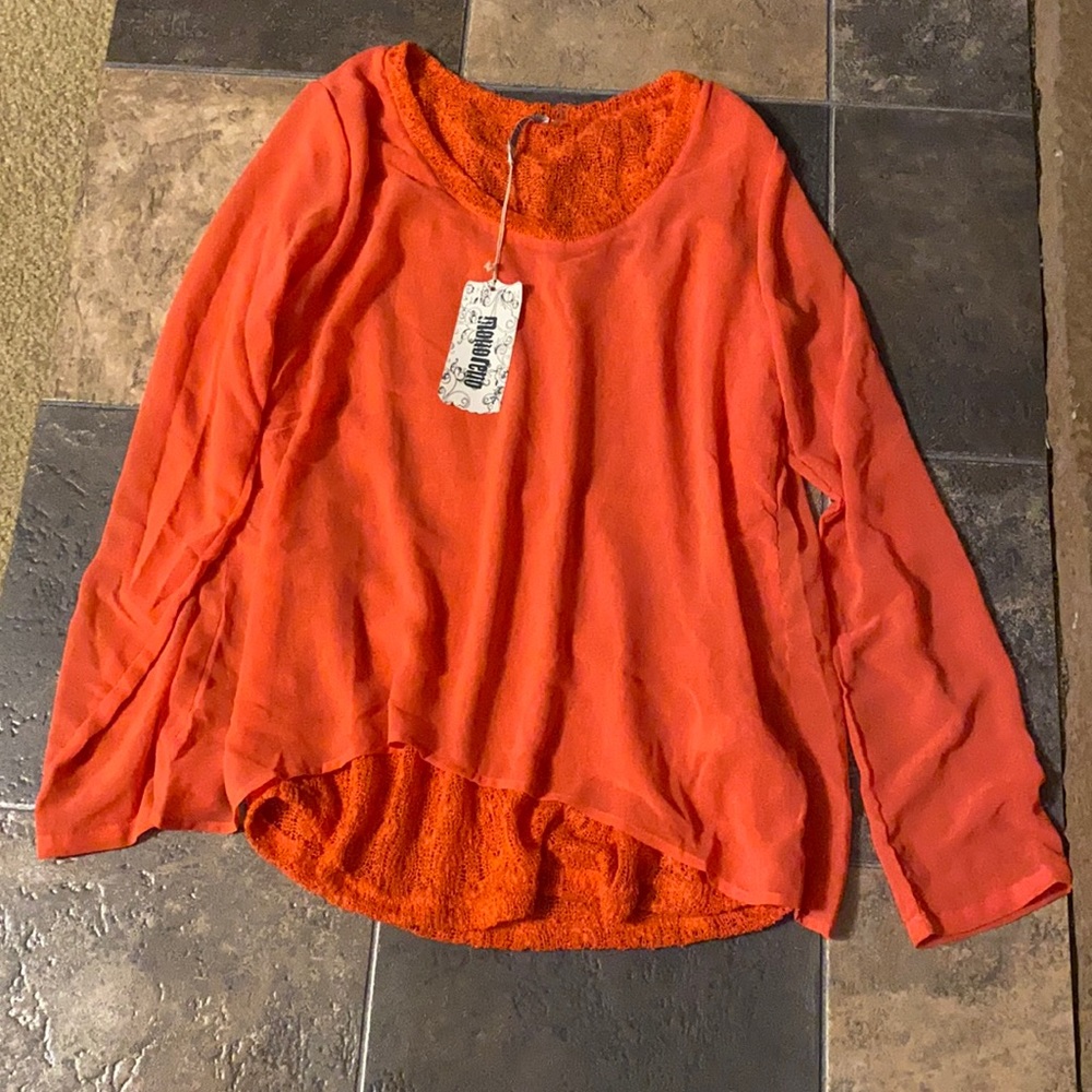 Monoreno blouse size medium, orange in color.